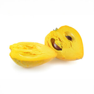 Bruce Canistel (Lucuma campechiana) mature fruit sliced and isolated on white